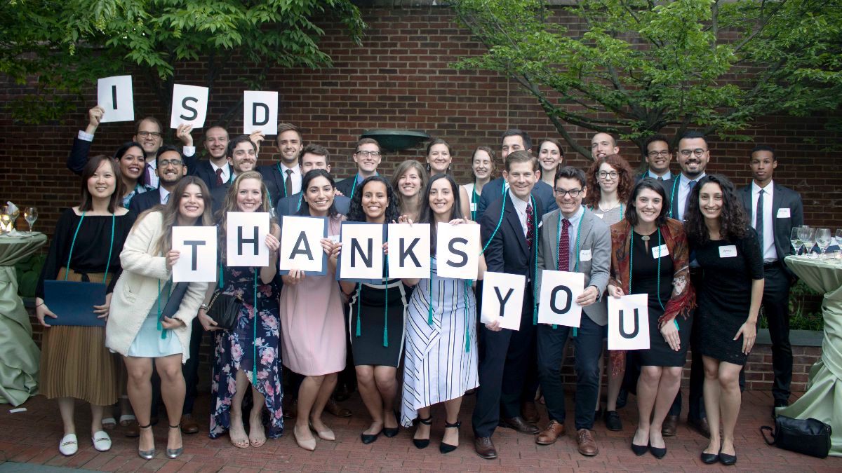 ISD students holding &quot;thank you&quot; signs