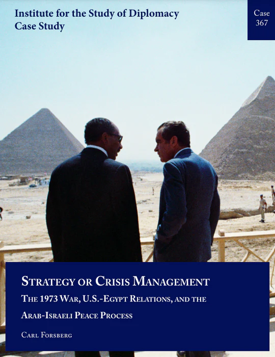 Two men standing in front of the Pyramid