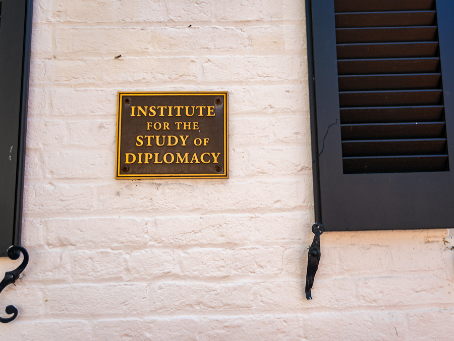 Brick wall with a plaque for the Institute for the Study of Diplomacy